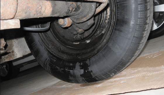 an image showing leaking brake line