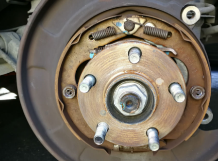an image showing improperly installed brake pads