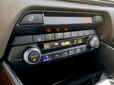 an a/c console inside of a car